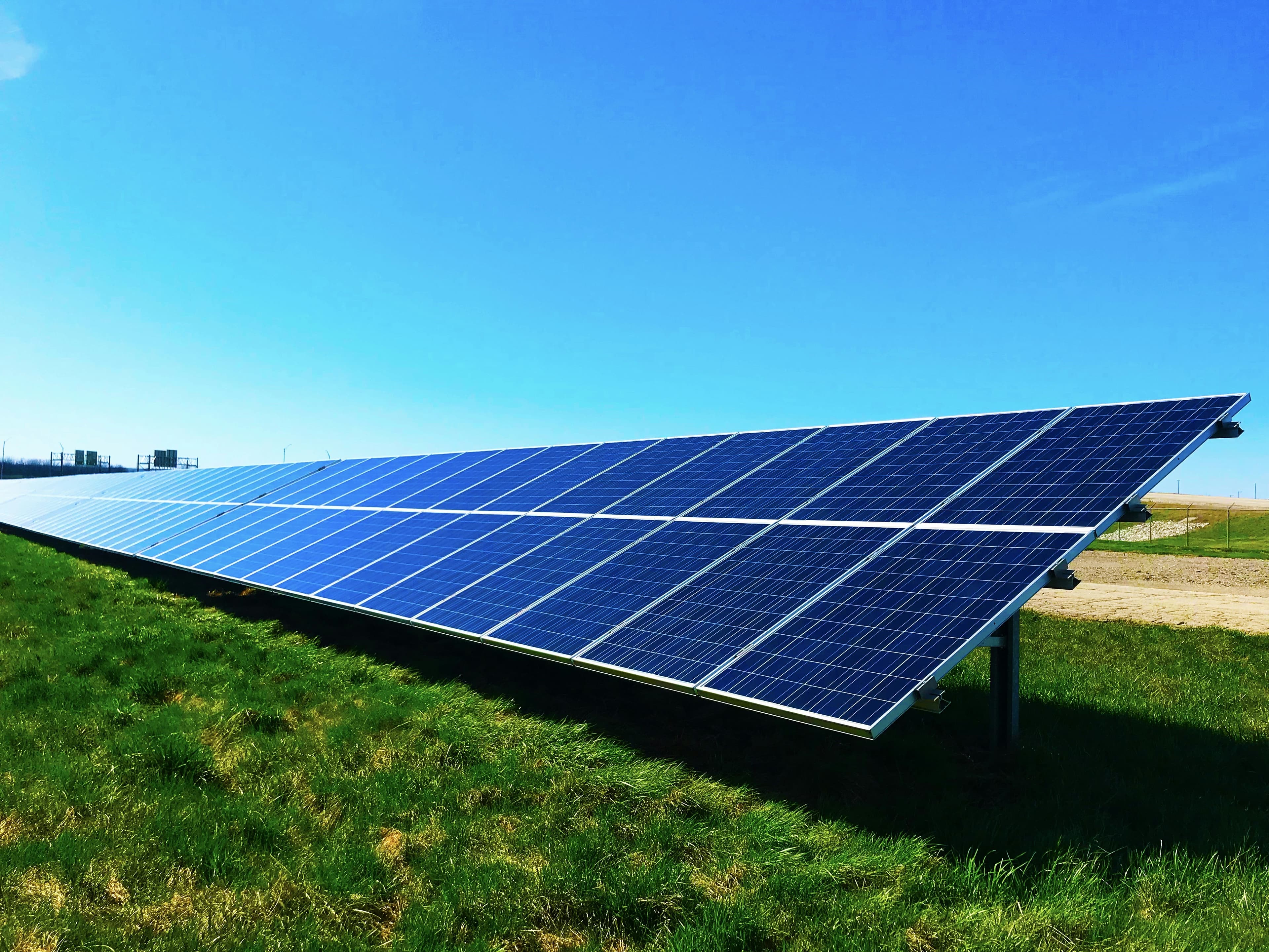 Small wind turbine and solar array at a ridgeline homestead